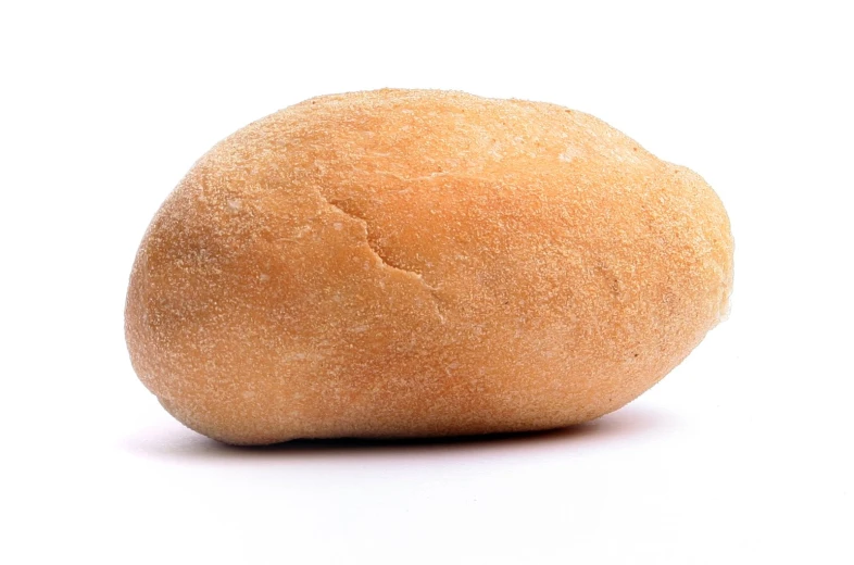 a whole wheat floured round ball on a white background