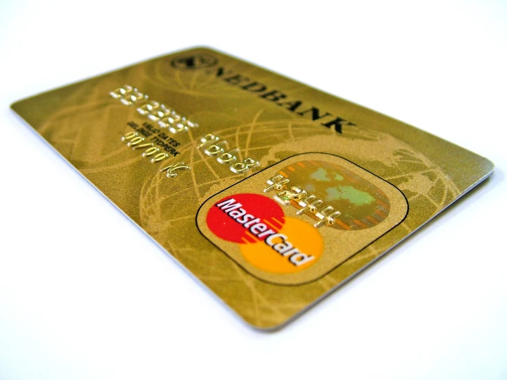 a gold card with an id and credit logo