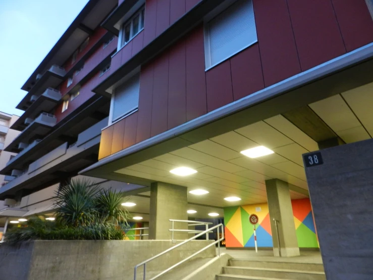 an outside view of an office building with staircase