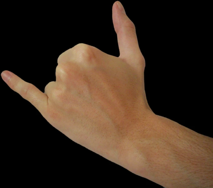 a hand making the middle finger sign with black background