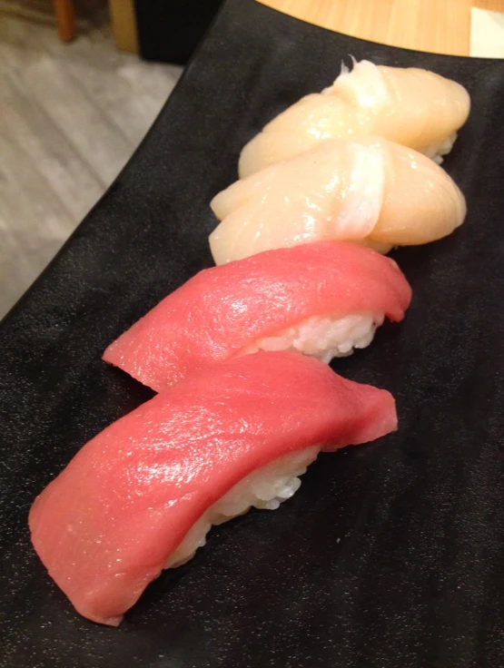 some sort of sushi dish in a row
