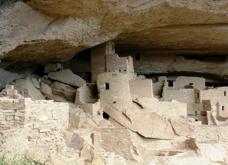 the cliff house is built right under the rock