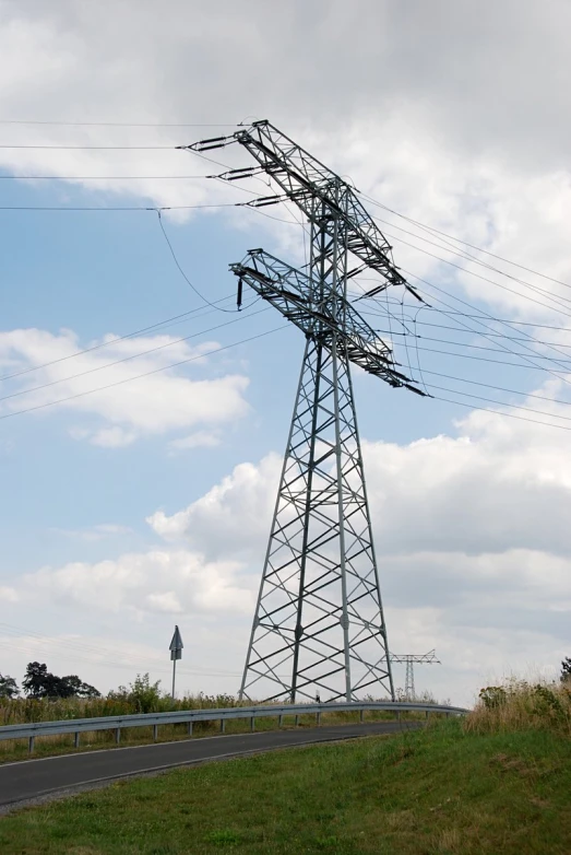 a power pole in the middle of a highway