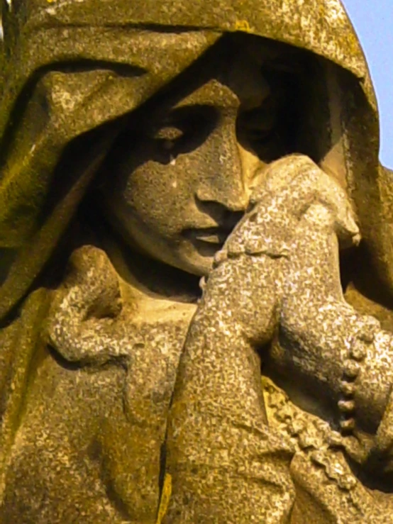 a statue with a child in her lap