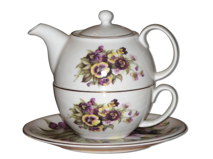 a purple and yellow floral tea set