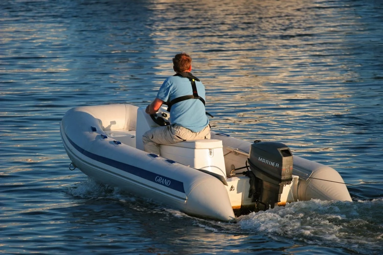 a person is out on the water in a small boat