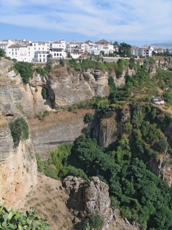 the view of a mountain town is overlooking the valley below