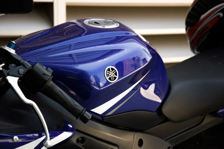 closeup of the front end of a blue motorcycle