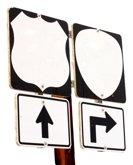 a white sign that has arrows pointing to the opposite directions