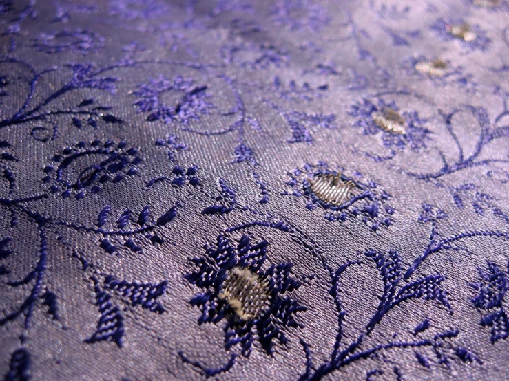 the blue fabric with the flowery design is very close to being up close