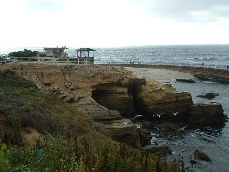 a rock outcropping on the ocean shore