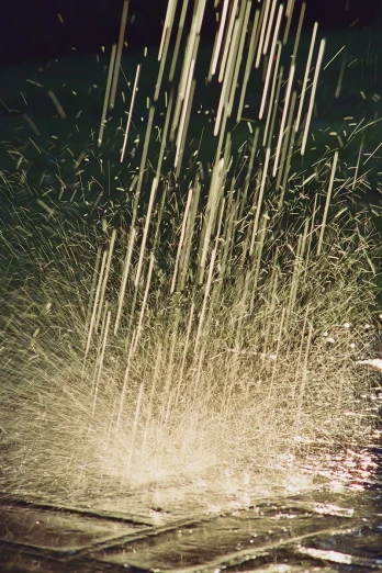 a black and white po of water shooting out
