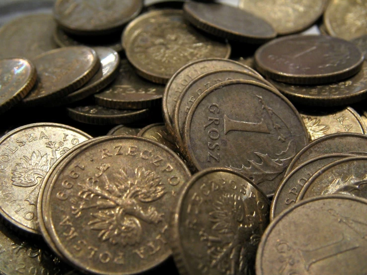 a close up picture of many coins