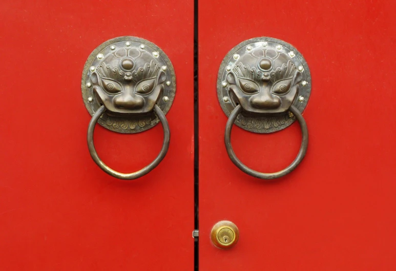 an ornate door handle has been decorated with silver decorations