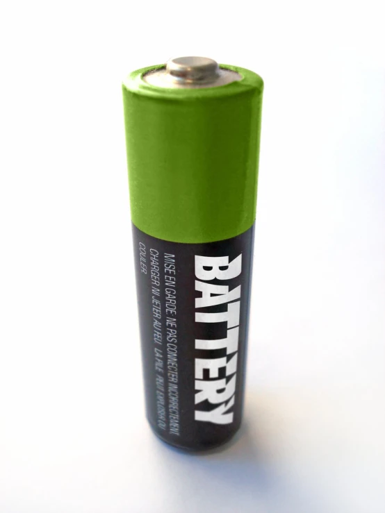 an open green battery is shown against a white background