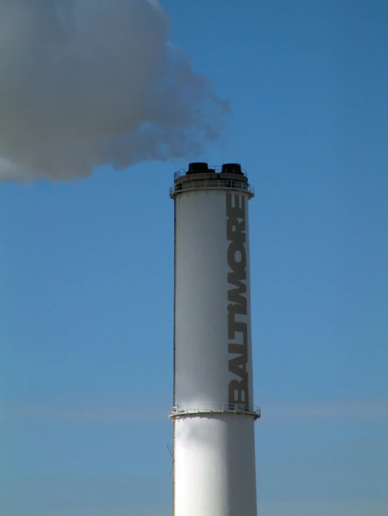 a large gray chimney with the words rattle on it