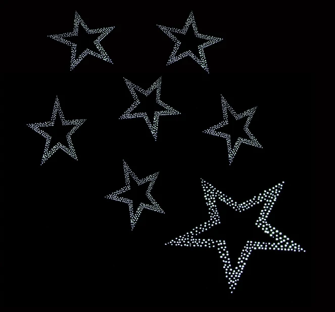 many stars in the dark sky and white dots