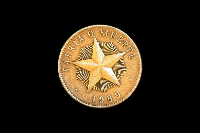 an antique coin with the stars on it