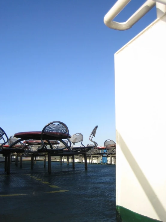 the back end of a boat on a body of water