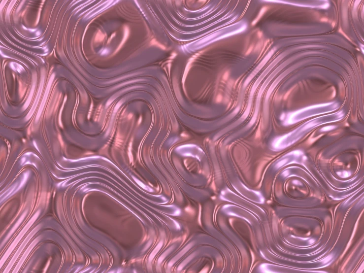 a metallic surface with a bunch of shapes on it