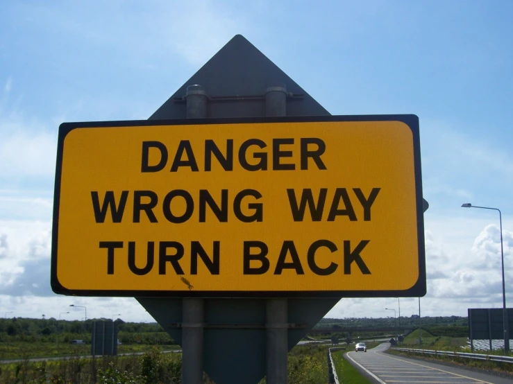 a sign indicating the dangers of wrong ways