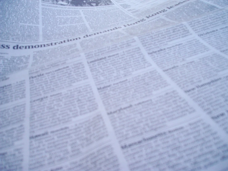 there is an image of an open newspaper