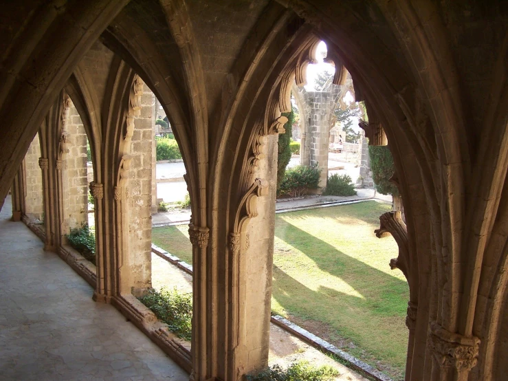 two very arches that are in front of a building