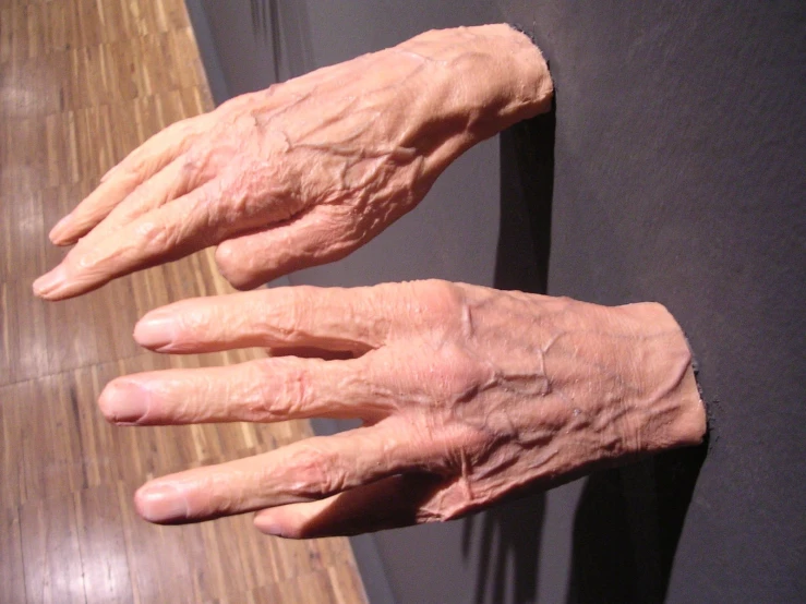close up on hands that are on a counter top