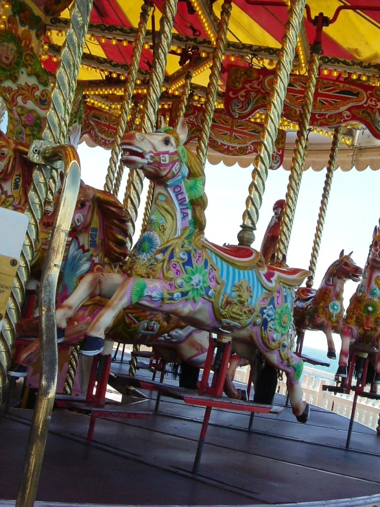 a carousel with colorful horse decorations on it