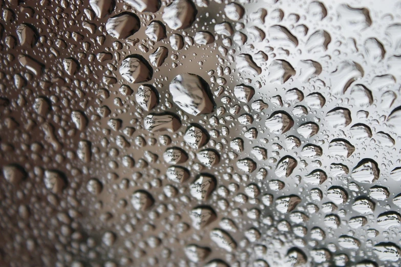 rain drops on the glass and another image from inside