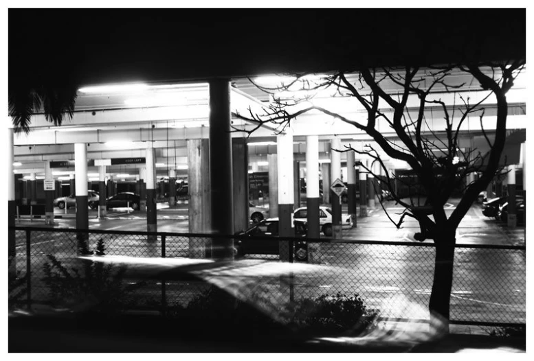 a car in a parking lot at night