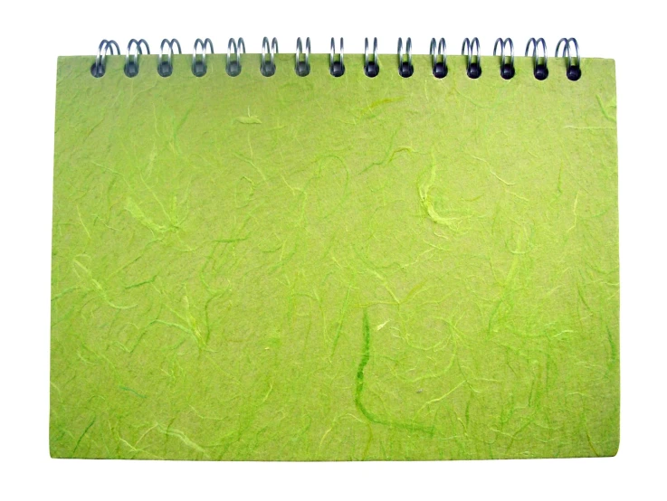 green spiral bound notebook with blue writing on the front of it