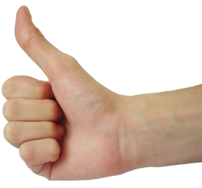 a person's hand giving the thumbs up sign