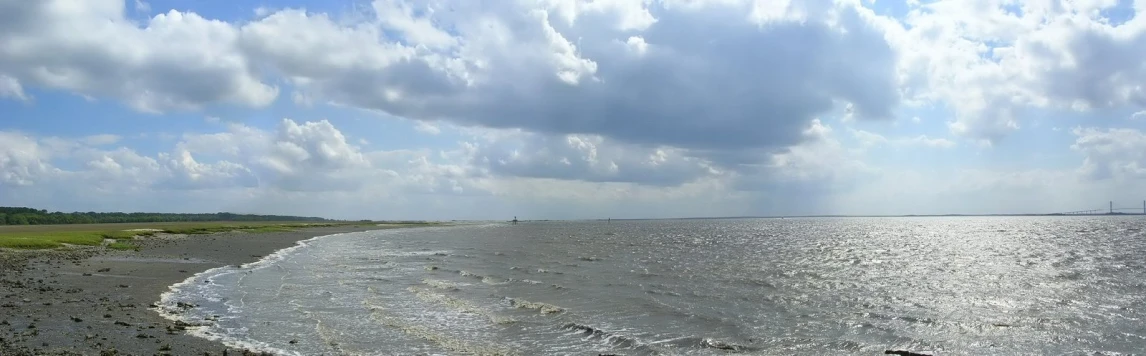 a beach that has many rocks on it