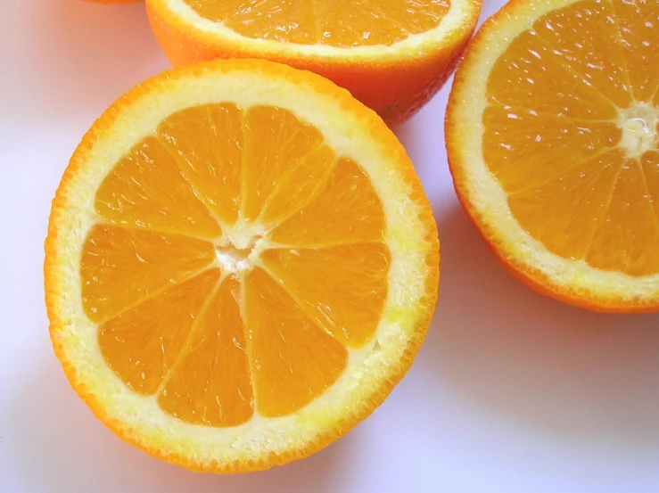 an orange sliced in half on a table