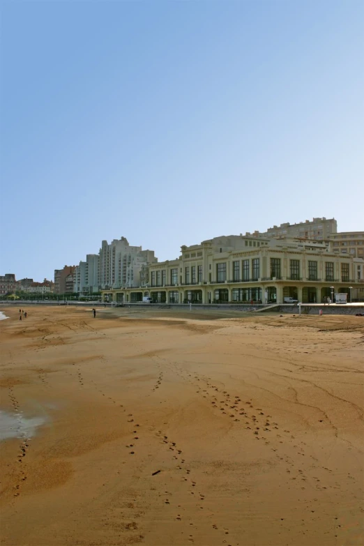 a couple of very pretty buildings near some water