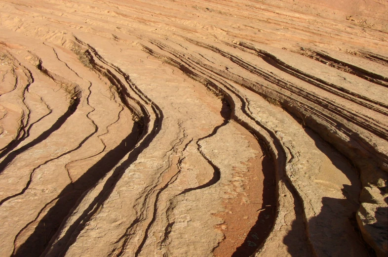 large lines of sand in the desert during high tide