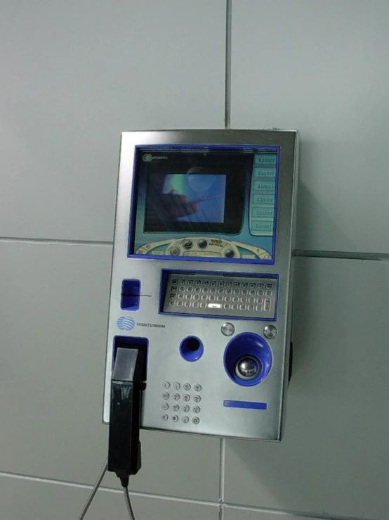 a machine that is connected to a wall with a remote