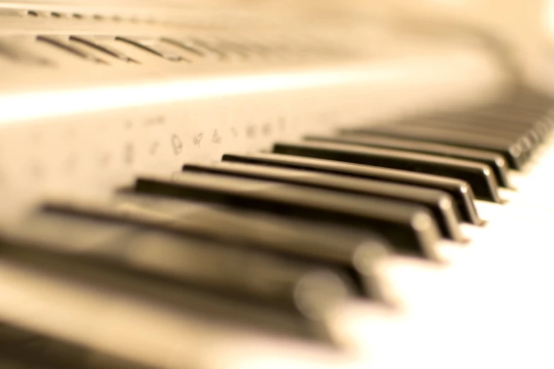a close up of the keys of a piano