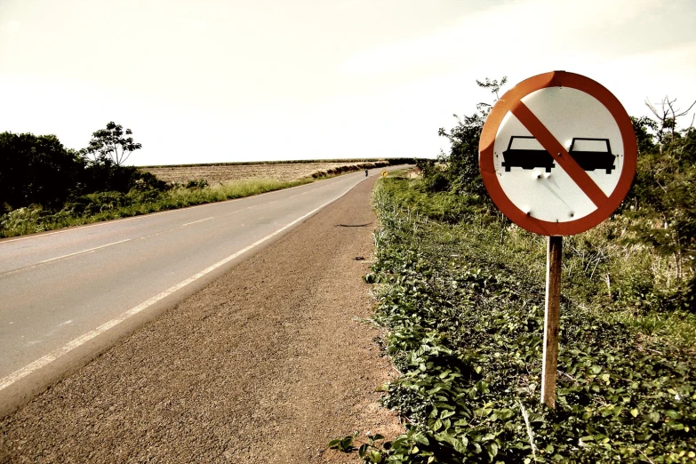 a street sign on the side of a road