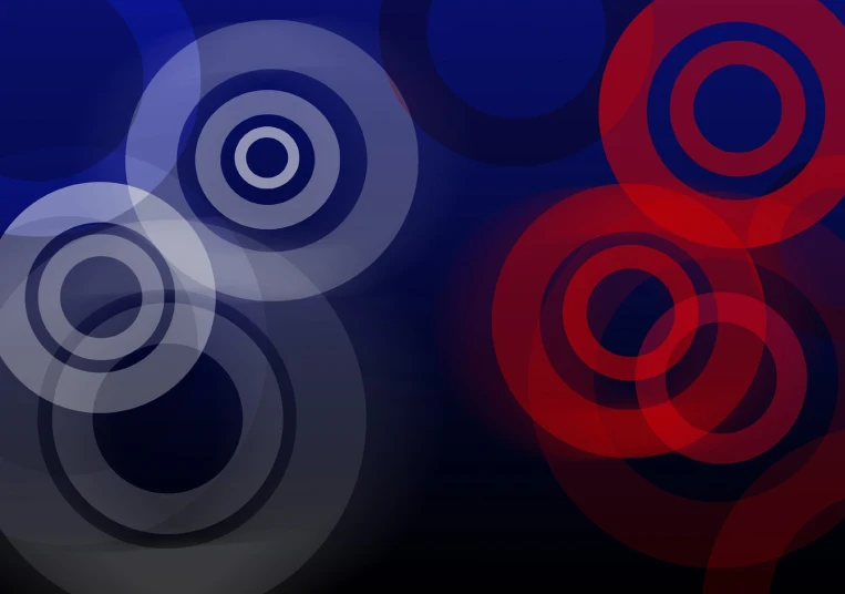 two circles that are on a black and blue background