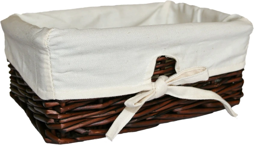 a large brown basket with a white lining
