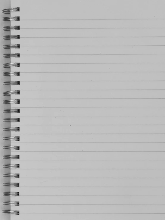 a spiral notebook opened to show lined paper