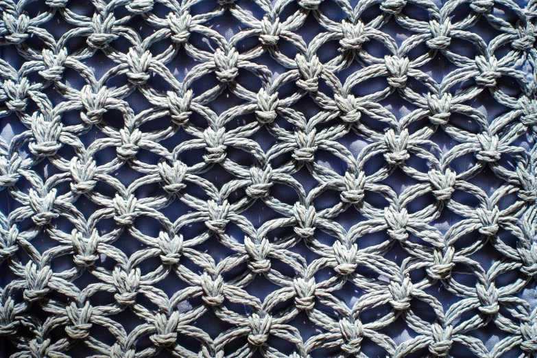 an intricate pattern has been fashioned on a piece of cloth