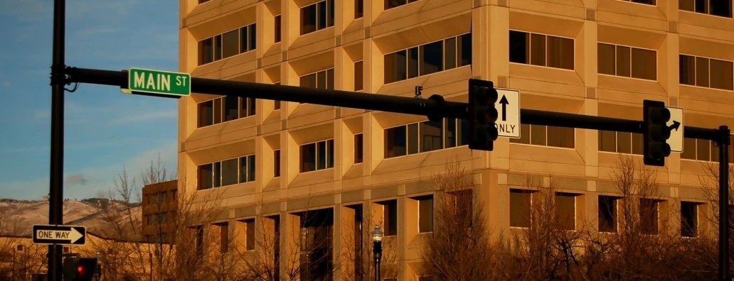 a high rise building with a large window in the middle