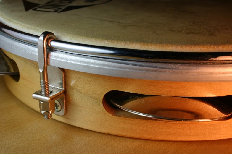a closeup of a musical instrument with gold finish