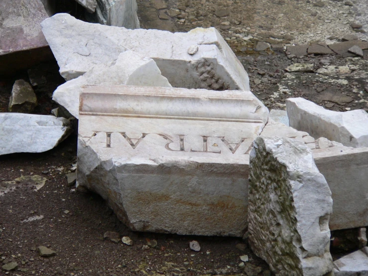 a small vase on some large rocks