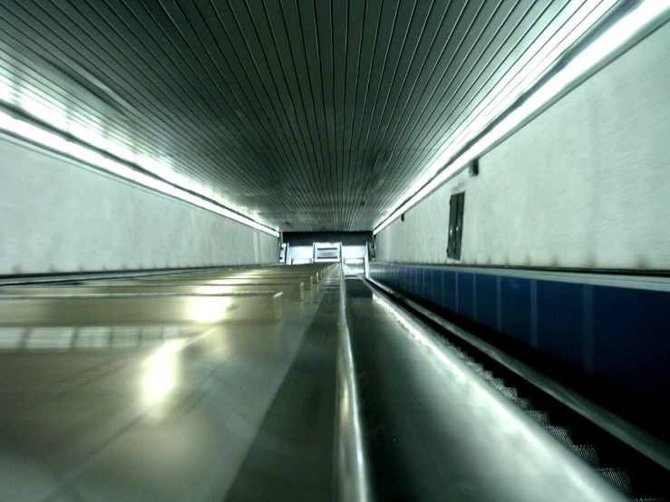 an empty corridor has white lines in it