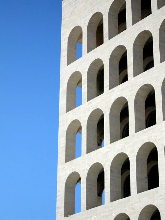 there is a large cement building with arched windows