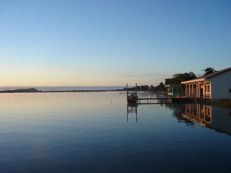 a house on the shore by the water